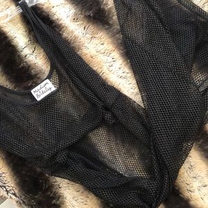 Cropped, long in the back tank top